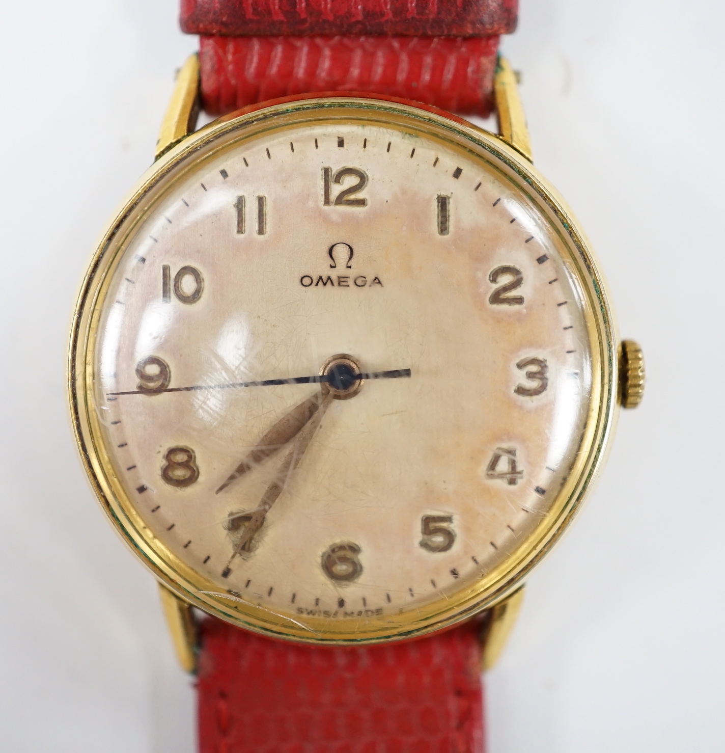 A gentleman's late 1940's gold plated Omega manual wind wrist watch, on associated leather strap, case diameter 32mm, no box or papers.